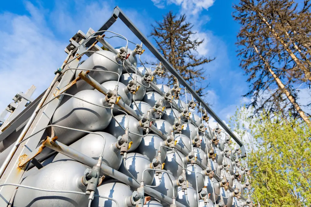 Propane-Bottles-stacked-ready-to-refill-or-swap